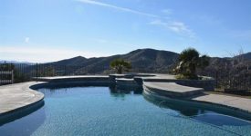 Ranch Style Home on 5 Acres with Large Detached Workshop, Pool, and Open Land All Around!