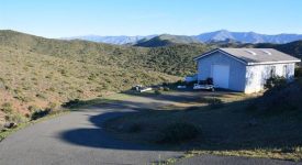 Ranch Style Home on 5 Acres with Large Detached Workshop, Pool, and Open Land All Around!