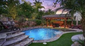 Americana Exterior With Tropical Backyard